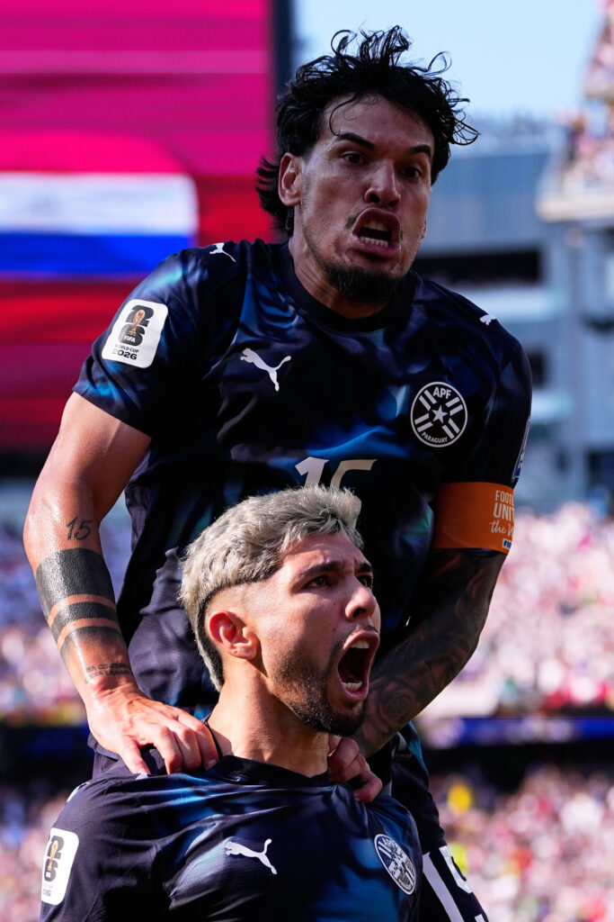 Paraguay players celebrate Julio Enciso goal